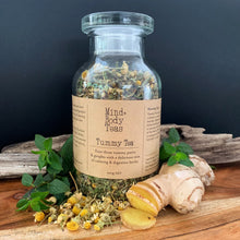 Load image into Gallery viewer, Un-tangle the knots and ease those tummy pains and gurgles with a fragrant mix of calming and digestive herbs that also taste delicious. The herbs in Tummy Tea have been selected for their ability to help when stress and anxiety affect digestion. Drink before, during or after a meal.

